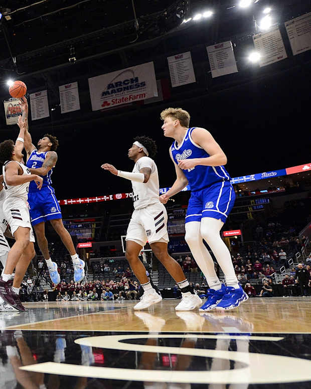 Mar 5, 2022; St. Louis, MO, USA; Drake Bulldogs forward Tremell Murphy (2) shoots as Missouri State Bears forward Gaige Prim (44) defends during overtime in the semifinals of the Missouri Valley Conference Tournament at Enterprise Center. Mandatory Credit: Jeff Curry-USA TODAY Sports